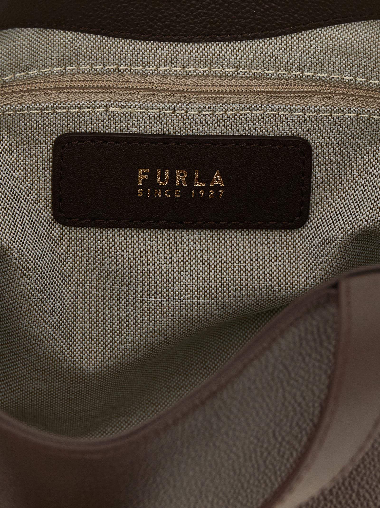 Tote Bag by Furla for women in calfskin leather brown & gold features an jet-set-ready silhouette, showcasing the Goccia Calfskin Leather Tote Bag design with a secure , ample , and versatile handle & adjustable-strap.