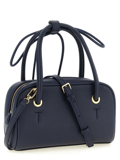 Dome Handbag by Furla for women in calfskin leather gold, navy & signature presents a ornamental silhouette, showcasing a secure zipper, ample , and versatile shoulder-strap & handle for a ornamental finish.