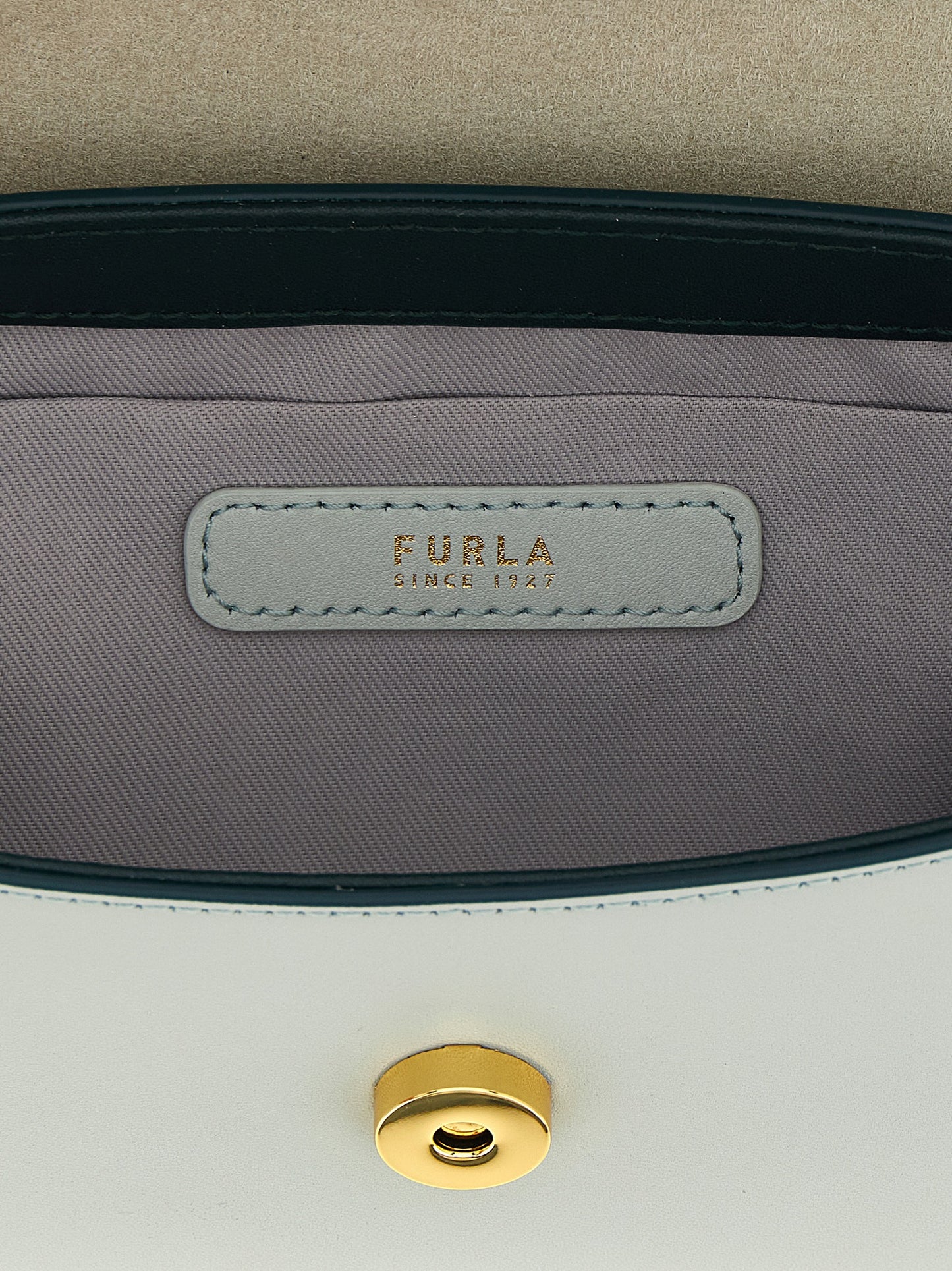 Handbag by Furla for women in calfskin leather bicolour, gold & green features a exquisite silhouette, showcasing a secure magnetic and exquisite with versatile shoulder-strap & handle for a exquisite finish.