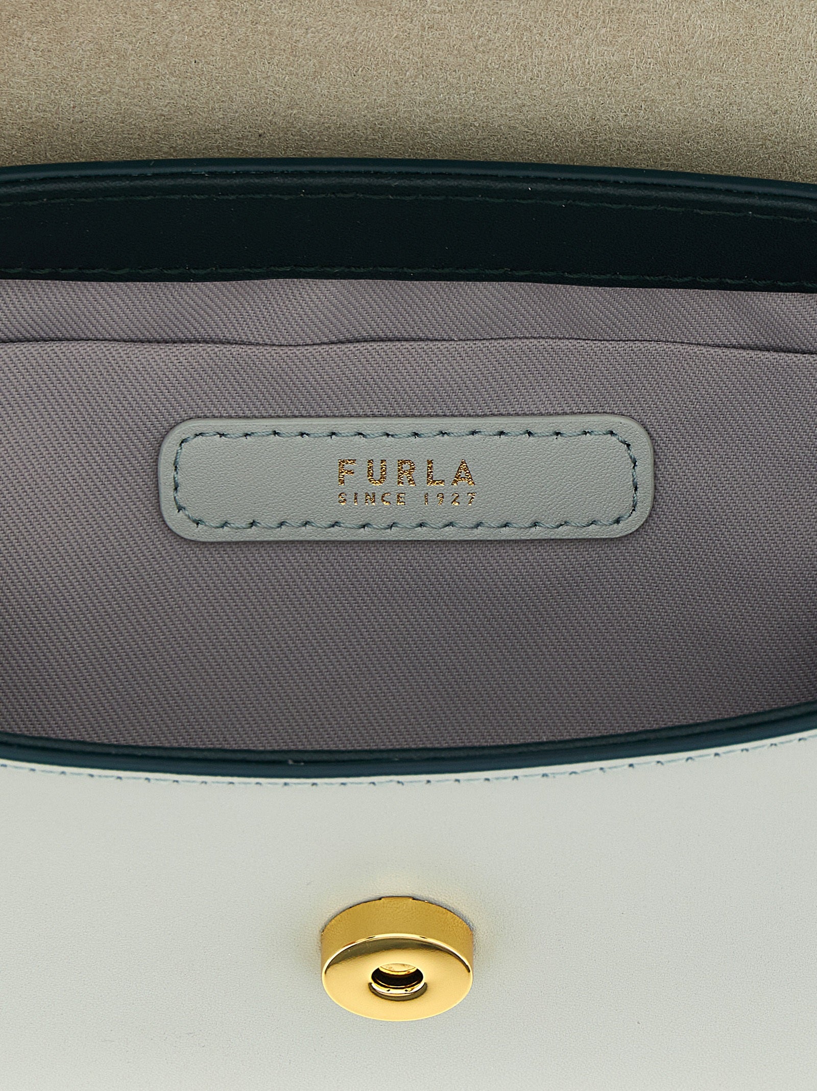 Handbag by Furla for women in calfskin leather bicolour, gold & green features a exquisite silhouette, showcasing a secure magnetic and exquisite with versatile shoulder-strap & handle for a exquisite finish.