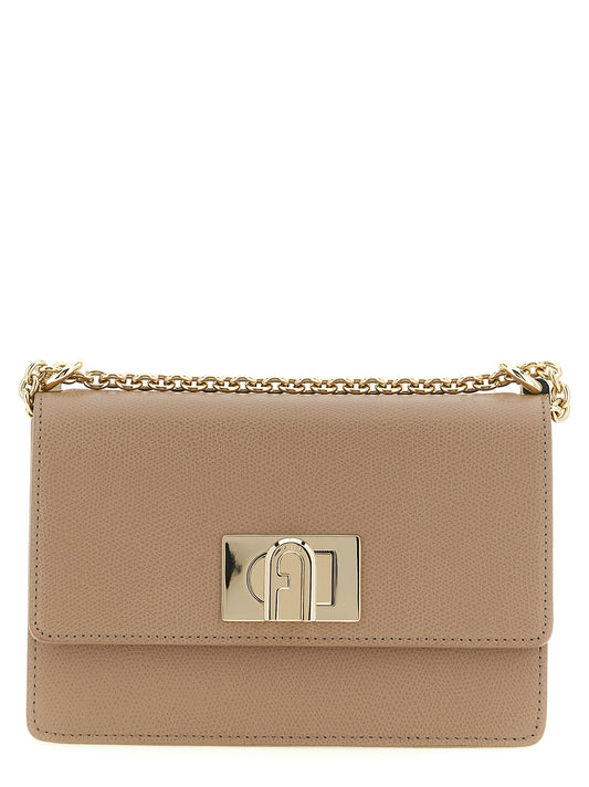 Mini Crossbody Handbag by Furla for women in calfskin leather beige features an versatile silhouette, showcasing a secure turn-lock and versatile with versatile crossbody-strap for a versatile finish.