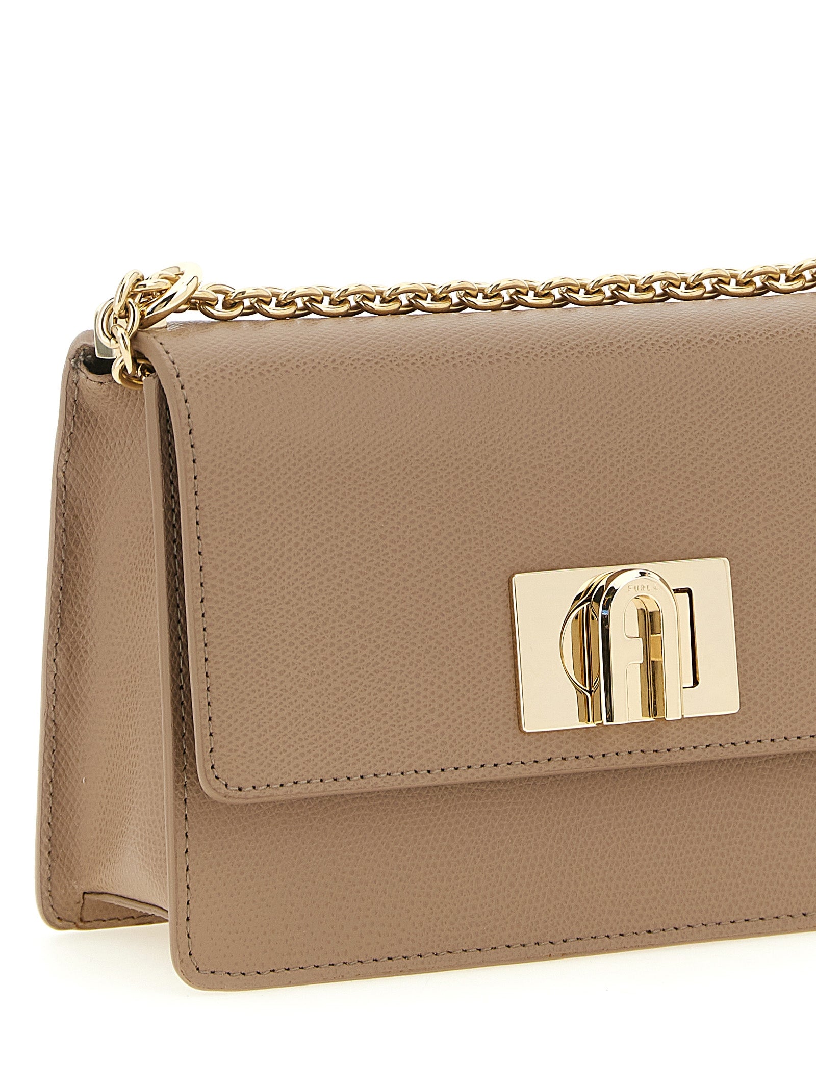 Mini Crossbody Handbag by Furla for women in calfskin leather beige features a transformative elegance silhouette, showcasing a secure turn-lock, organized , and versatile crossbody-strap for a transformative elegance look.