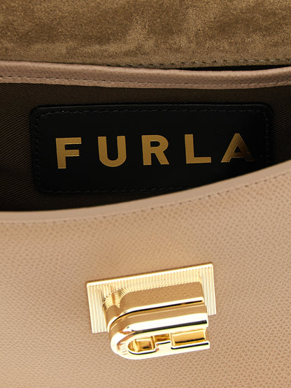 Mini Crossbody Handbag by Furla for women in calfskin leather beige features a transformative sophistication silhouette, showcasing a secure turn-lock, ample , and versatile crossbody-strap for a transformative sophistication look.