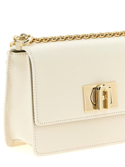 Mini 2-in-1 Shoulder & Crossbody Handbag by Furla for women in calfskin leather gold & white features an multi-faceted design with a secure turn-lock, ample , and versatile crossbody-strap & shoulder-strap for a multi-faceted finish.