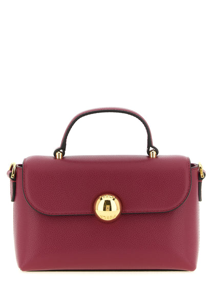 This Flap Handbag by Furla for women in bos taurus calfskin leather and burgundy, multicolor & red presents a sculptural silhouette featuring a secure flap & magnetic, ample , and versatile shoulder-strap, handle & adjustable-strap for a sculptural finish.