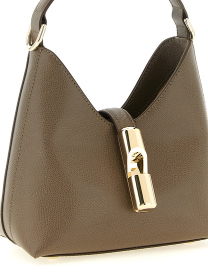This Mini Hobo Handbag by Furla for women in bos taurus calfskin leather and bicolour, gold & green presents a sculptural silhouette featuring a secure , ample , and versatile shoulder-strap & handle for a sculptural finish.