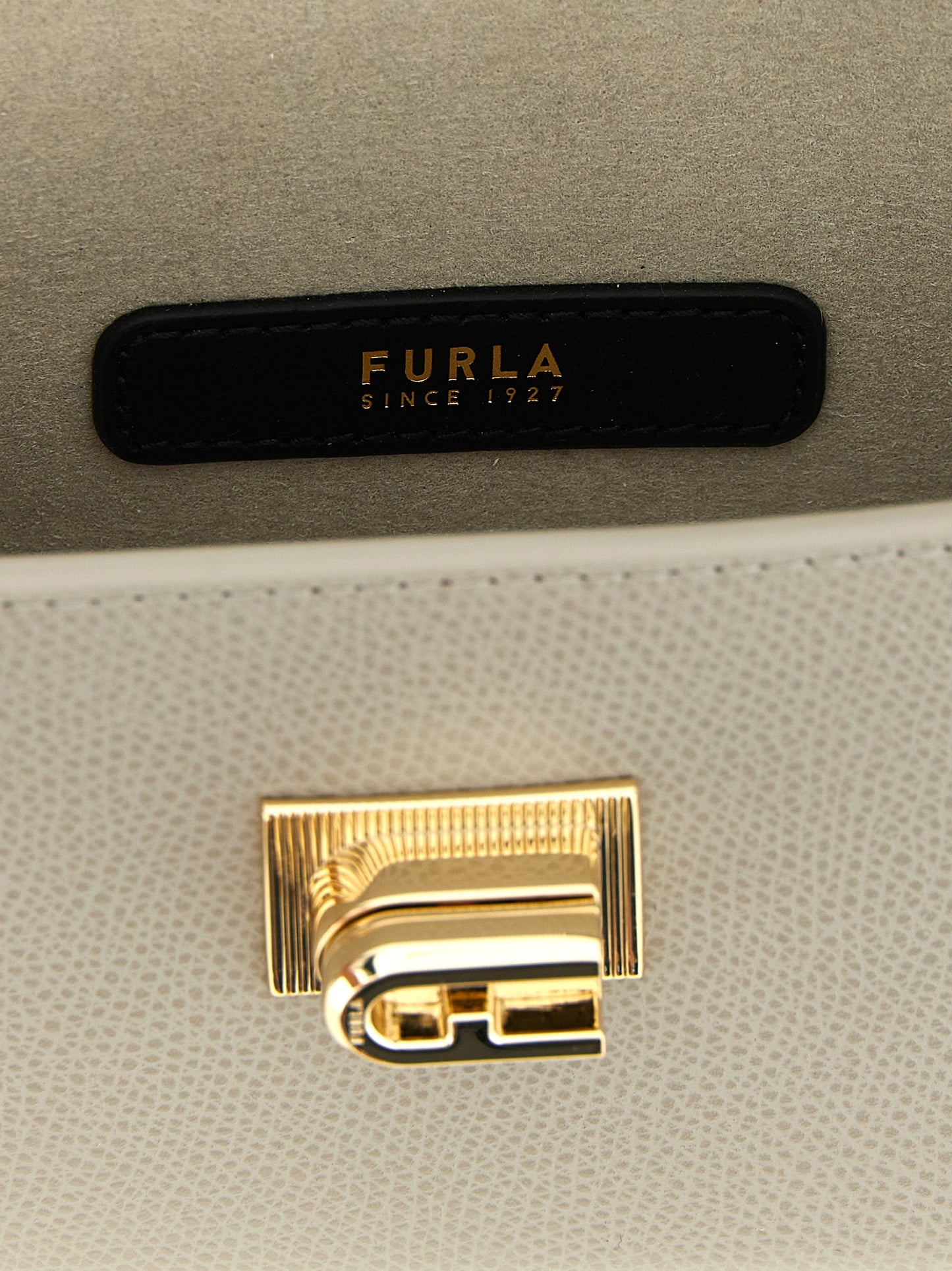 Mini Crossbody Flap Handbag by Furla for women in calfskin leather gray showcases a versatile sophistication silhouette, featuring a secure flap & turn-lock, versatile sophistication , and versatile crossbody-strap for a versatile sophistication finish.
