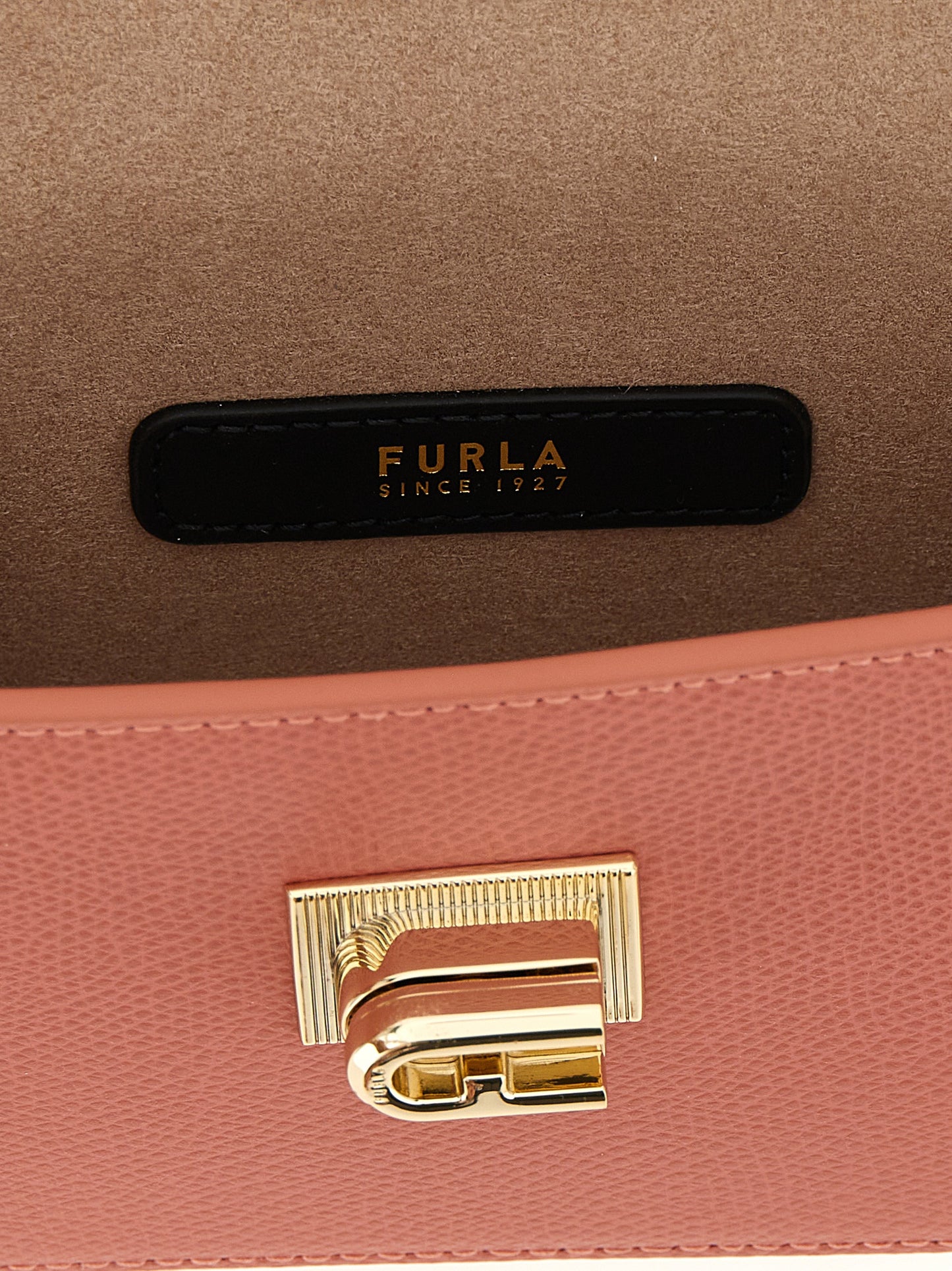 Mini Crossbody Handbag by Furla for women in calfskin leather black, multicolor & pink features an multi-faceted design with a secure clasp, ample , and versatile crossbody-strap for a multi-faceted finish.