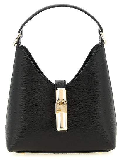 This Mini Handbag by Furla for women in calfskin leather & cotton and black & gold presents a sculptural silhouette featuring a secure zipper & clasp, ample , and versatile shoulder-strap, handle & adjustable-strap for a sculptural finish.
