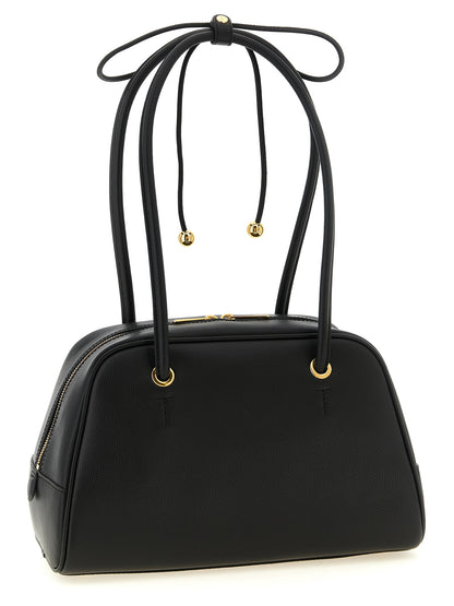 Dome Handbag by Furla for women in calfskin leather black & gold features a refined silhouette, showcasing a secure zipper, organized , and versatile handle for a refined finish.