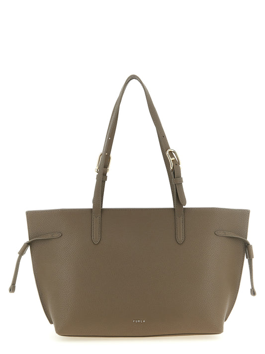 Tote Bag by Furla for women in bos taurus calfskin leather gray, gold & signature features an jet-set Ava Bos Taurus Calfskin Leather Tote Bag design with a secure buckle, ample , and versatile adjustable-strap & handle for an jet-set finish.