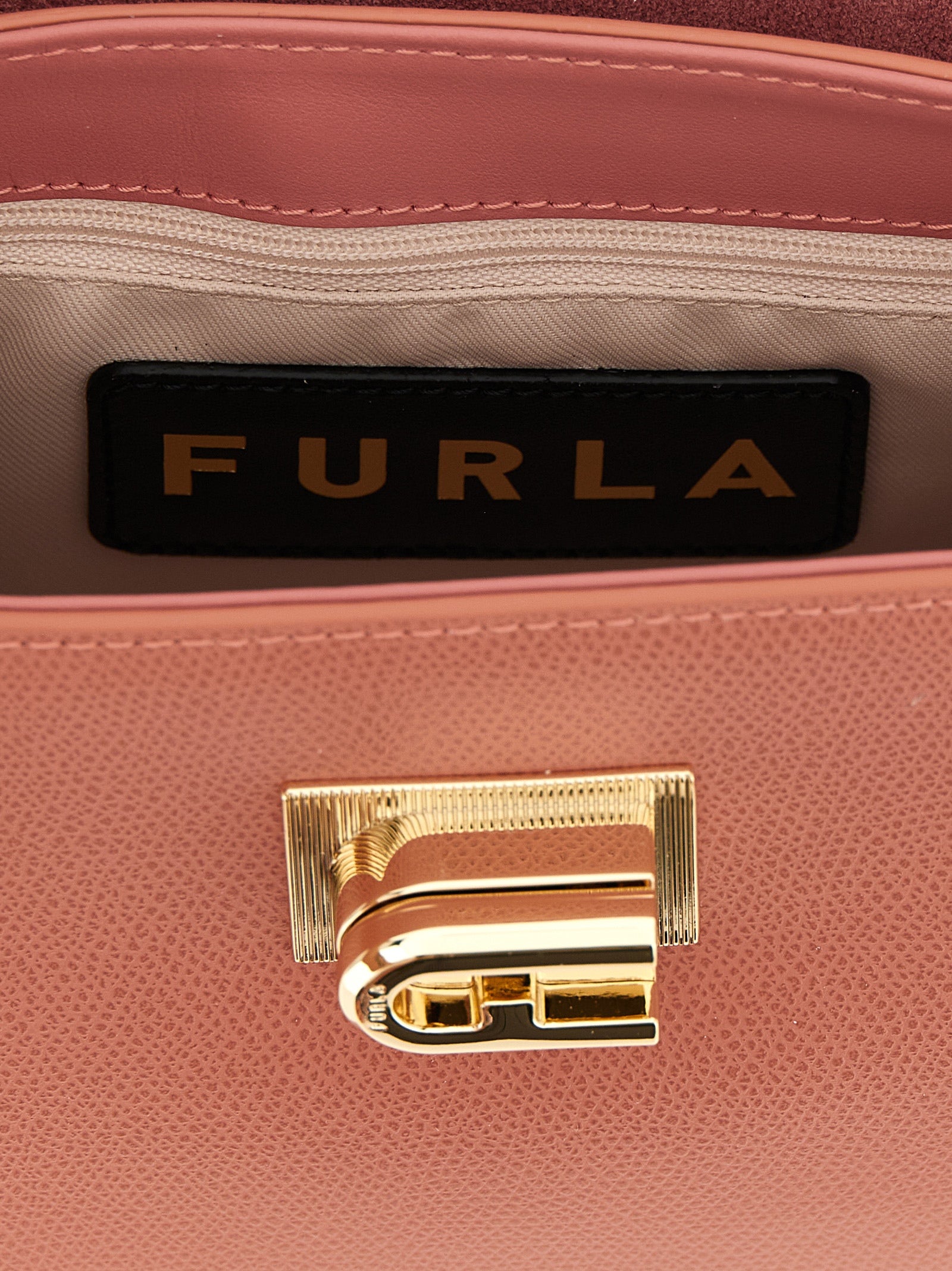 Mini Handbag by Furla for women in calfskin leather gold, multicolor, pink & signature features a refined silhouette, showcasing a secure , organized , and versatile handle & adjustable-strap for a refined finish.