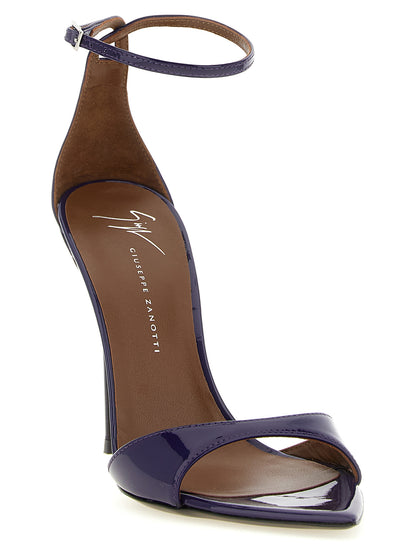 Stiletto Ankle Strap Sandals by Giuseppe Zanotti for women in calfskin leather plum, purple & silver showcases a sculptural silhouette as Women's Calfskin Leather Stiletto Ankle Strap Sandals, defined by a sculptural stiletto and sculptural for a sculptural look.