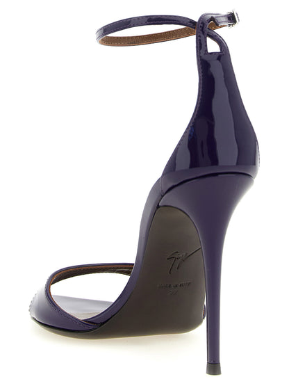 Stiletto Ankle Strap Sandals by Giuseppe Zanotti for women in calfskin leather and plum, purple & silver presents a captivating silhouette, showcasing the signature style of the Women's Calfskin Leather Stiletto Ankle Strap Sandals with a captivating stiletto and captivating .