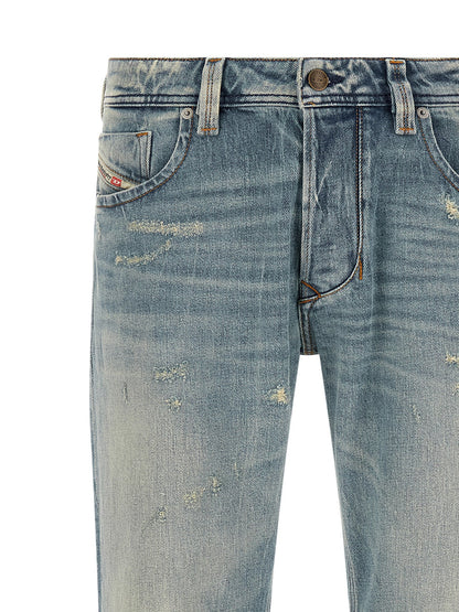 Jeans by Diesel for men in stretch denim cotton light-blue & signature presents a refined pantology silhouette, artfully defined by a refined pantology straight-leg, long, and a sophisticated low rise.