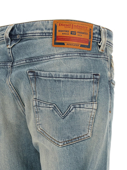 Jeans by Diesel for men in stretch denim cotton light-blue & signature presents a refined pantology silhouette, artfully defined by a refined pantology straight-leg, long, and a sophisticated low rise.