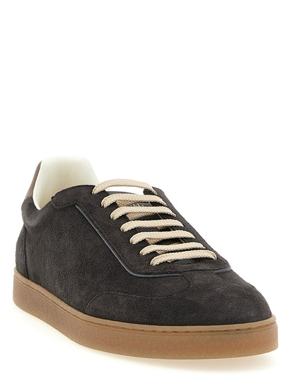 Sneakers by Brunello Cucinelli for men in bos taurus suede calfskin leather gray presents a on trend silhouette from the Men's Low Top Bos Taurus Suede Calfskin Leather Sneakers collection, showcasing a on trend low-top style for an elevated aesthetic.