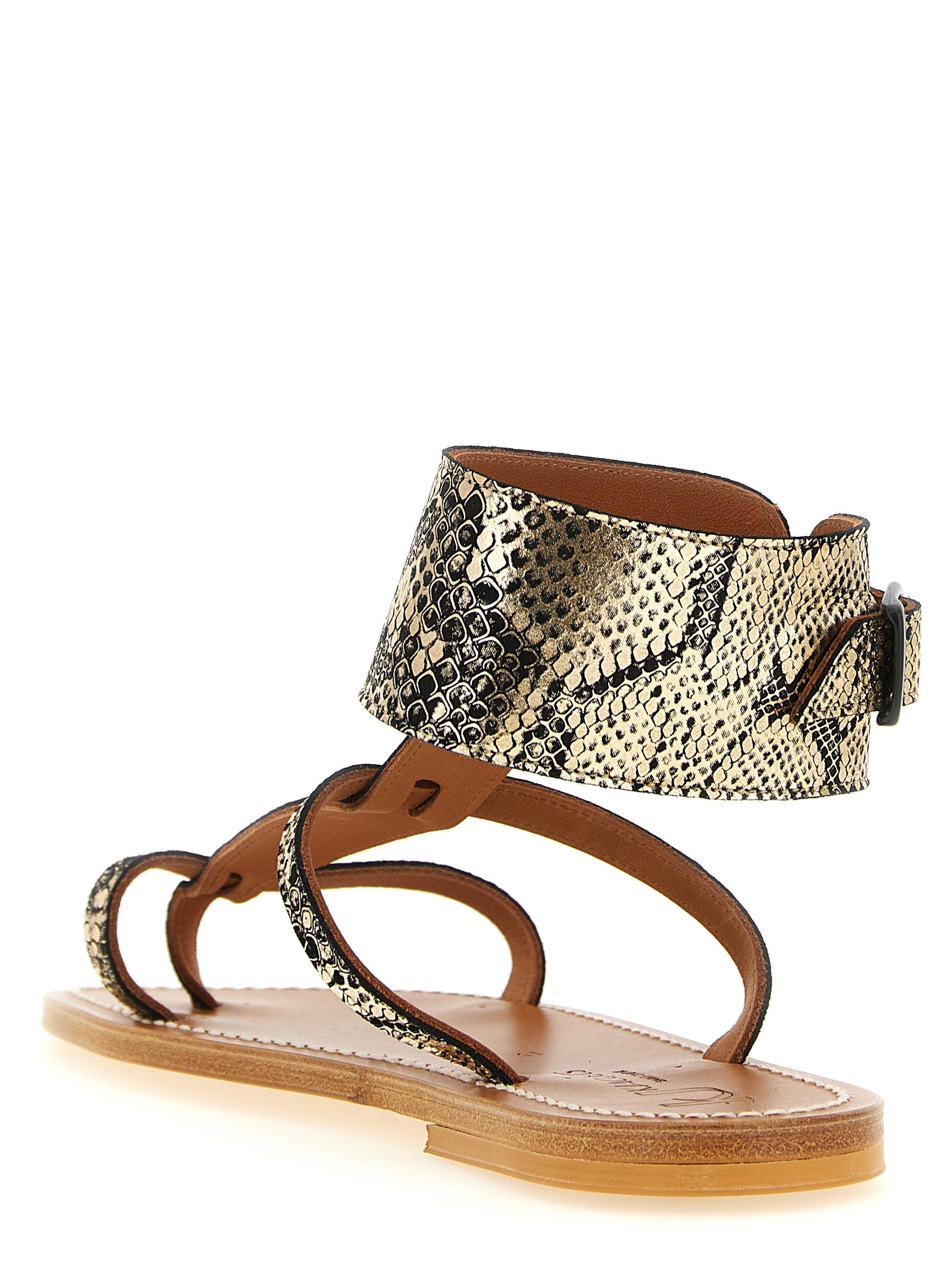 Flat Thong Sandals by K.JACQUES SAINT TROPEZ for women in goatskin python leather gray, gold, white & print features an architectural design from the Women's Goatskin Python Leather Flat Thong Sandals collection, defined by a architectural flat and for a architectural finish.