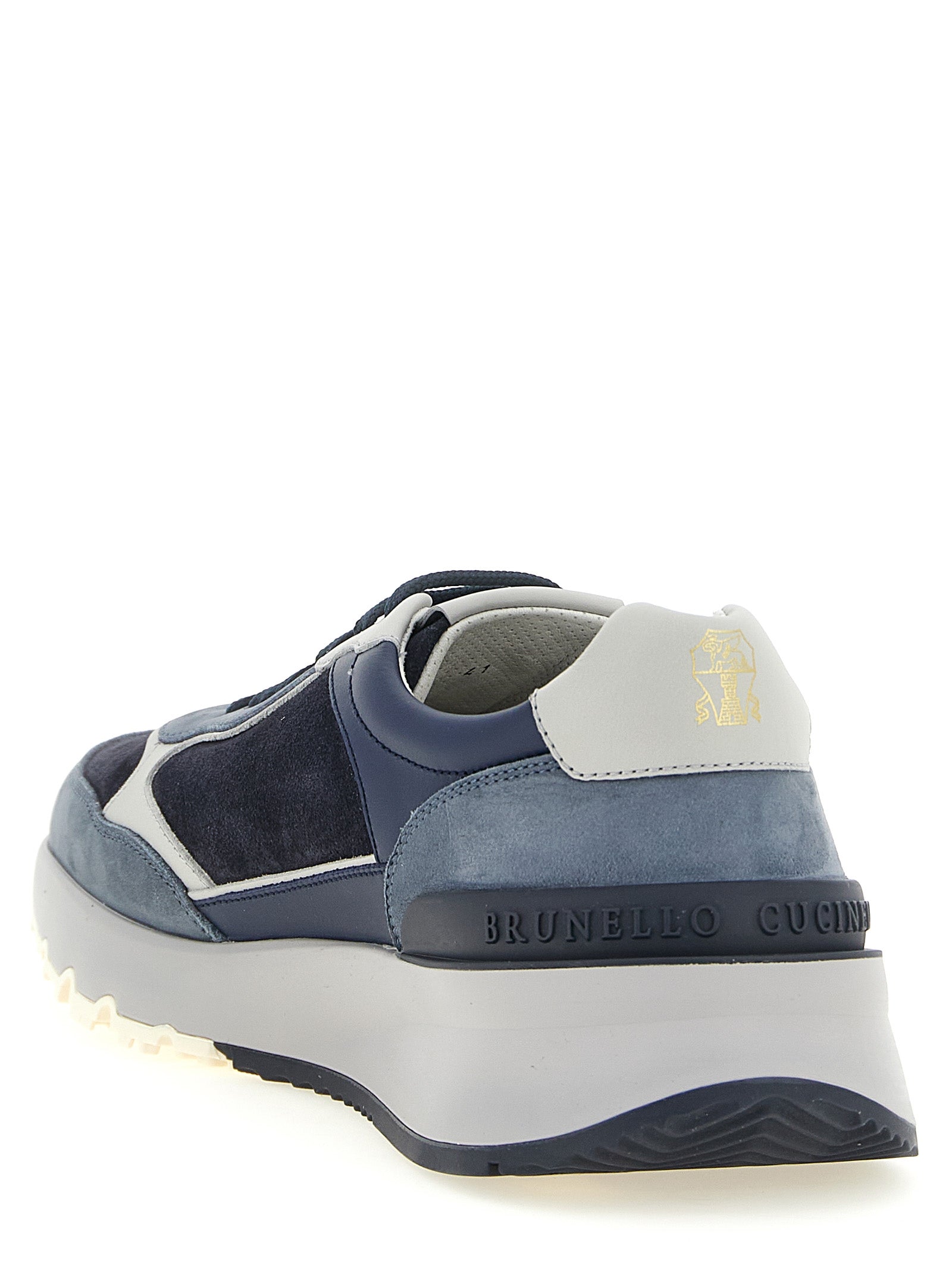 Athletic Sneakers by Brunello Cucinelli for men in suede calfskin leather light-blue, navy, white & signature showcases an impeccable silhouette, defined by an impeccable athletic style design that perfectly captures the essence of the Men's Athletic Suede Calfskin Leather Sneakers.