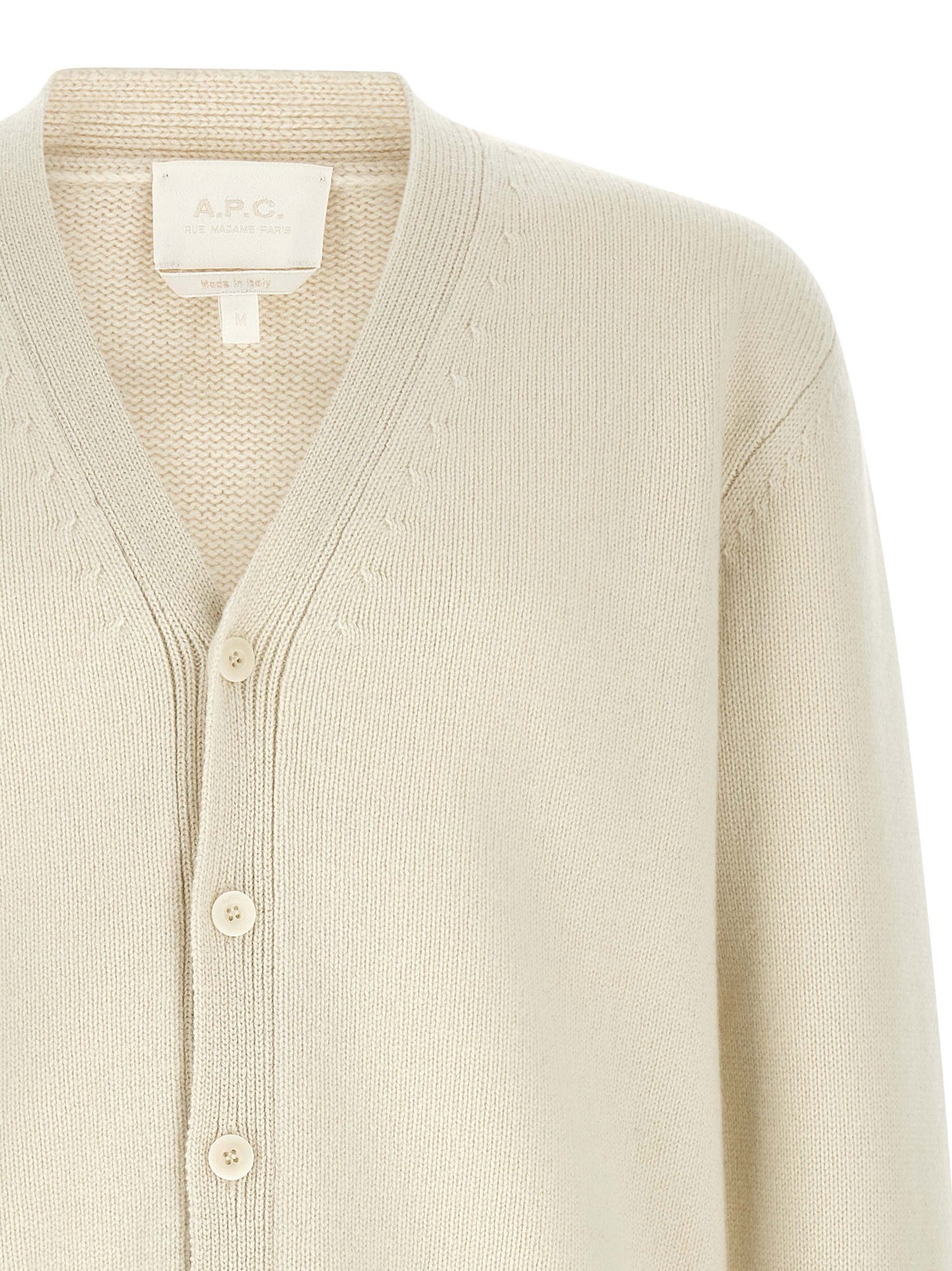 Cardigan by A.P.C. for men in wool white & patterned presents a textural silhouette, artfully finished with a textural v-neck neckline and for a sophisticated, textural look.