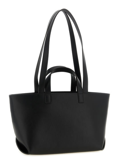 Small Shopper Tote Clutch Bag by A.P.C. for women in cotton polyester canvas black & gold features an jet-setting Le Drummer Cotton Polyester Canvas Small Shopper Tote Clutch Bag design with a secure zipper, jet-setting , and versatile handle for a jet-setting look.