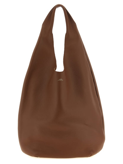 Shoulder Hobo Bag by A.P.C. for women in suede leather brown, gold & hazelnut features a stately silhouette, showcasing a secure , ample , and stately shoulder-strap & handle for a stately finish.