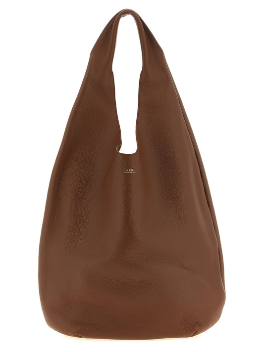 Shoulder Hobo Bag by A.P.C. for women in suede leather brown, gold & hazelnut features a stately silhouette, showcasing a secure , ample , and stately shoulder-strap & handle for a stately finish.