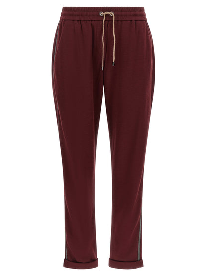 Joggers by Brunello Cucinelli for women in cotton & silk bordeaux features an refined tailoring silhouette, showcasing a premium with a and long cut for a refined tailoring look.