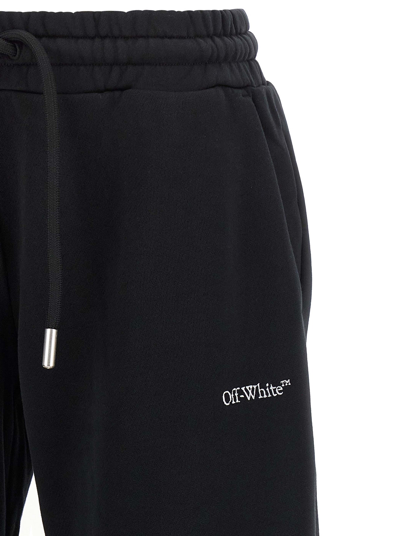 Joggers by Off-White for women in cotton black, silver, white & signature features a refined silhouette with a refined flared, relaxed-fit & wide, defined by a and a refined long for a refined finish.