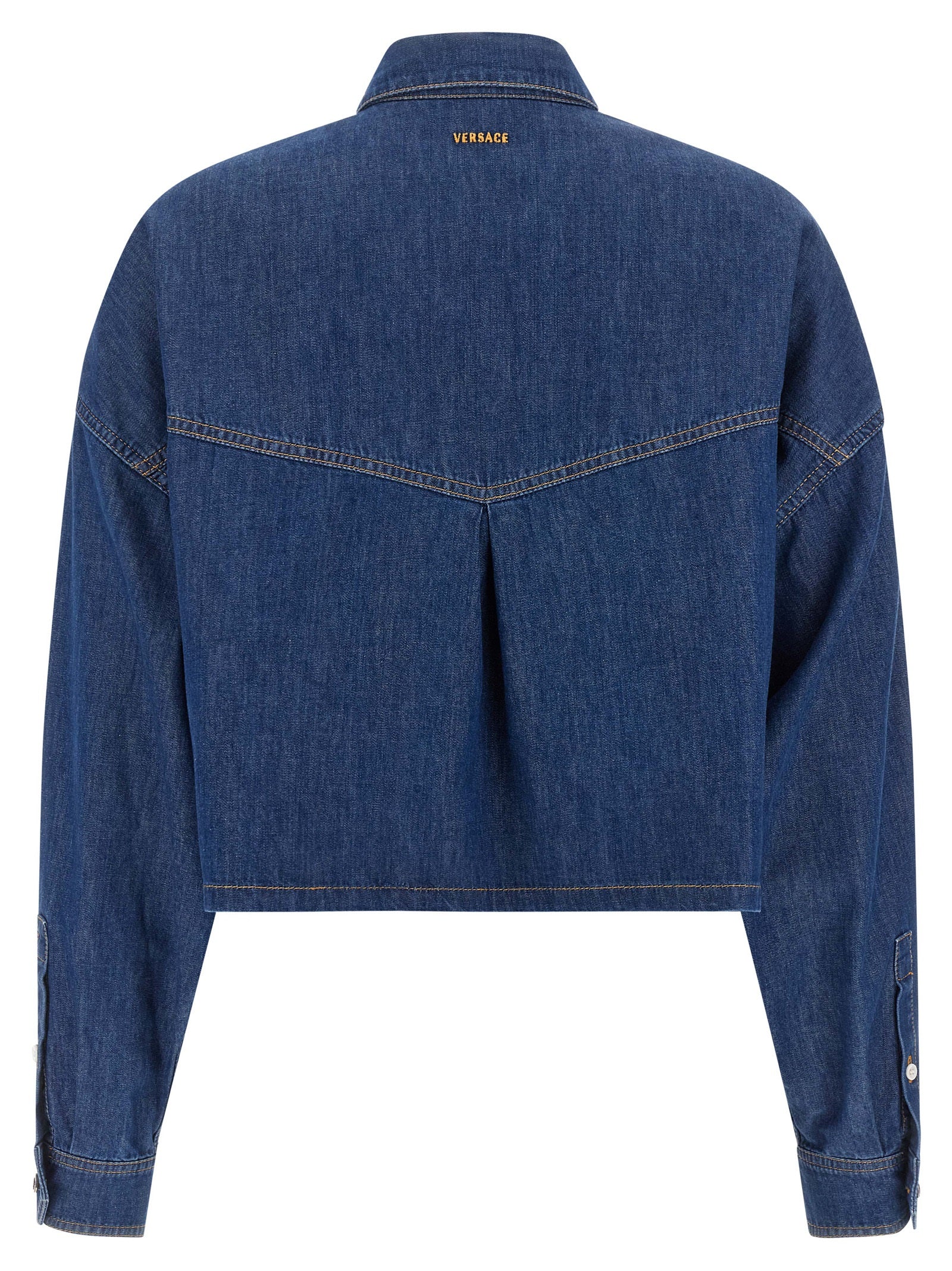 Blouse by Versace for women in denim cotton blue & silver showcases a sharp silhouette, elegantly detailed with a sharp square neckline and sharp .
