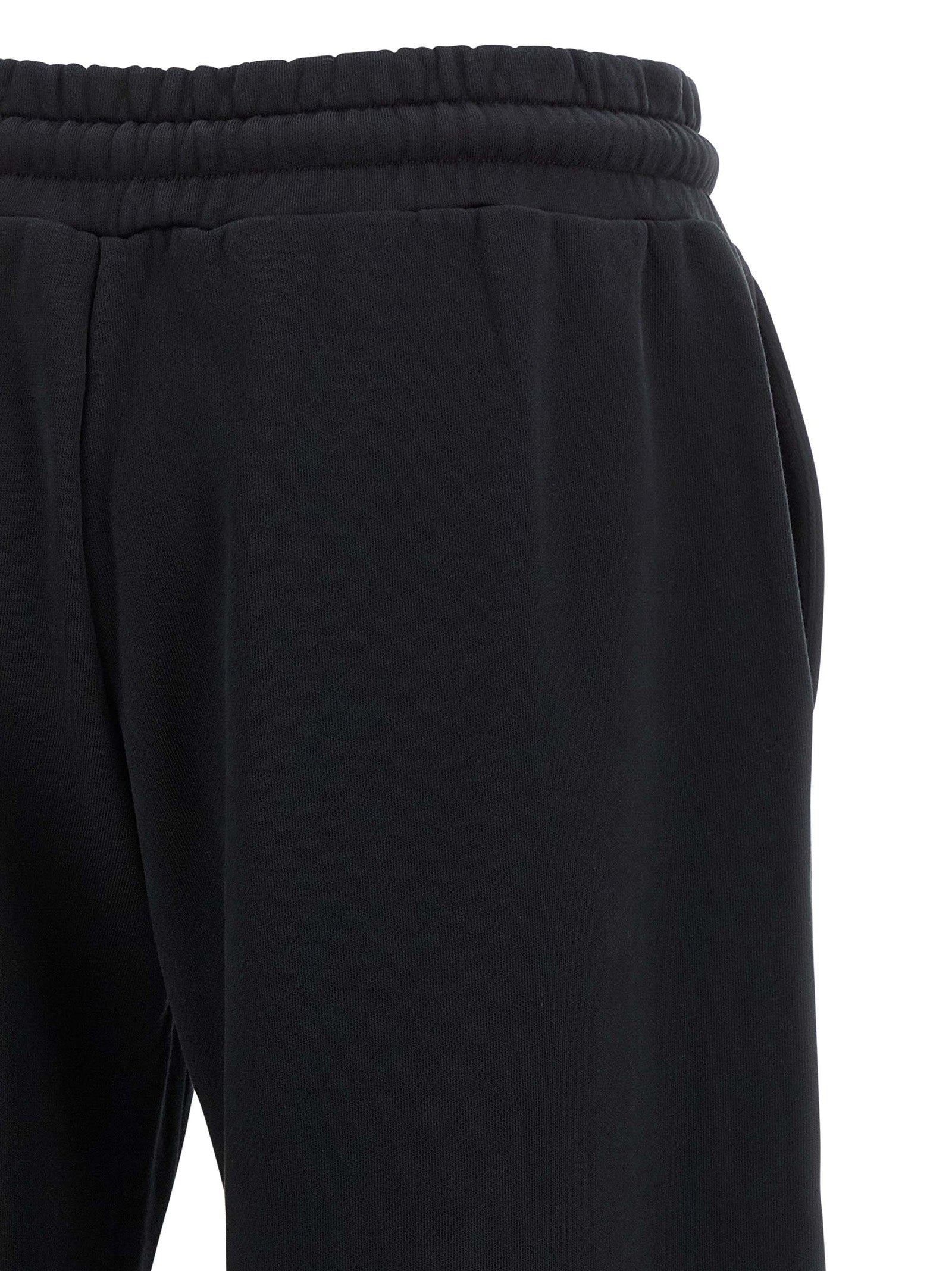 Joggers by Off-White for women in cotton black, silver, white & signature features an sophisticated and flared, relaxed-fit & wide with a precise long, creating a sophisticated and sophisticated silhouette.