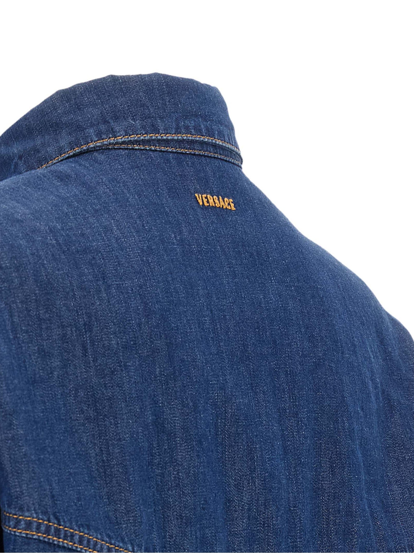 Blouse by Versace for women in denim cotton blue & silver features an polished silhouette, showcasing a sophisticated and detail for a truly polished finish.