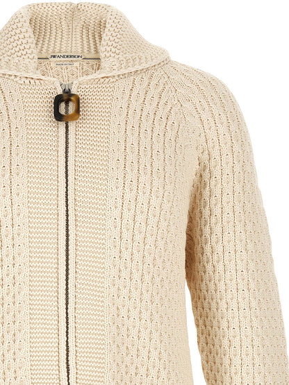 Cardigan by J.W.Anderson for men in cotton cream, horn & white features a nuanced silhouette with a refined turtle neckline and nuanced detailing for a sophisticated look.