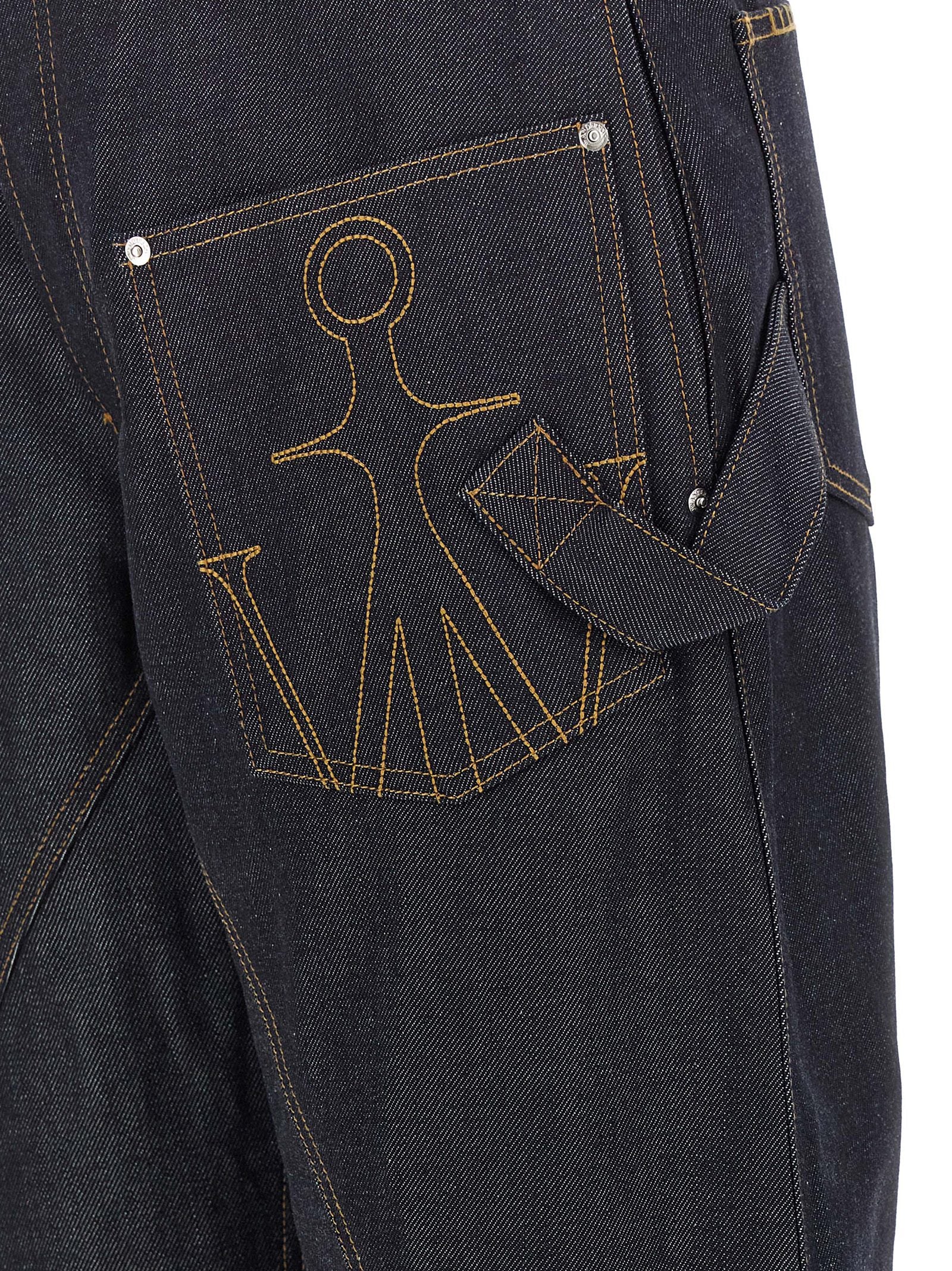 Jeans by J.W.Anderson for women in cotton denim blue & indigo features an sartorial straight-leg & wide and long with a cut for a sartorial finish.