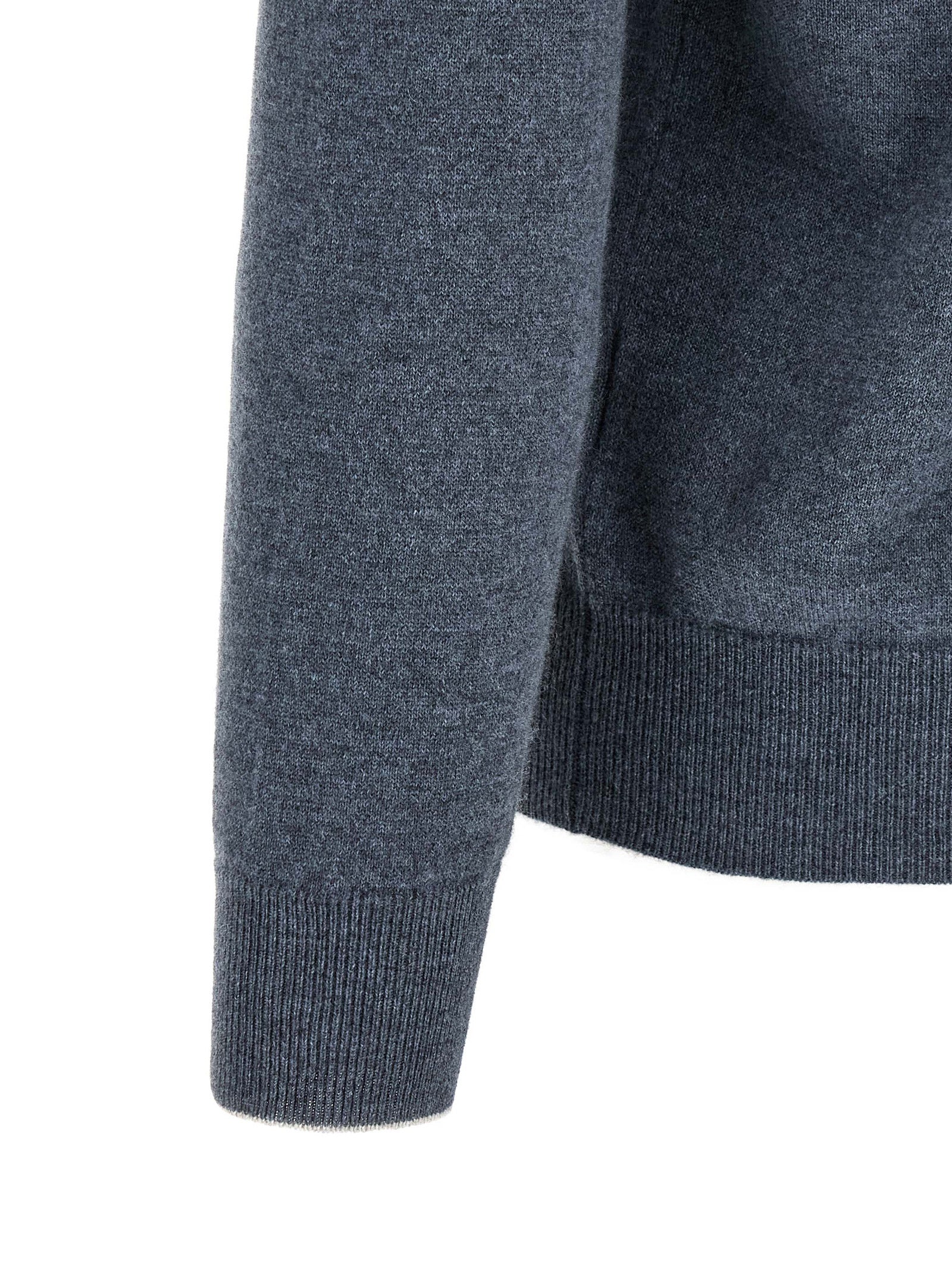 Cardigan by Brunello Cucinelli for men in cashmere blue showcases a luxurious silhouette, meticulously detailed with a sophisticated high-neck neckline and for a refined finish.