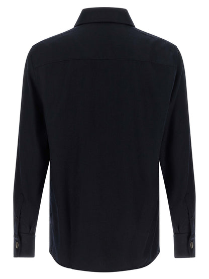 Overshirt by Brunello Cucinelli for men in virgin wool & flannel blue showcases a sharp silhouette, elegantly detailed with a sharp and sharp .
