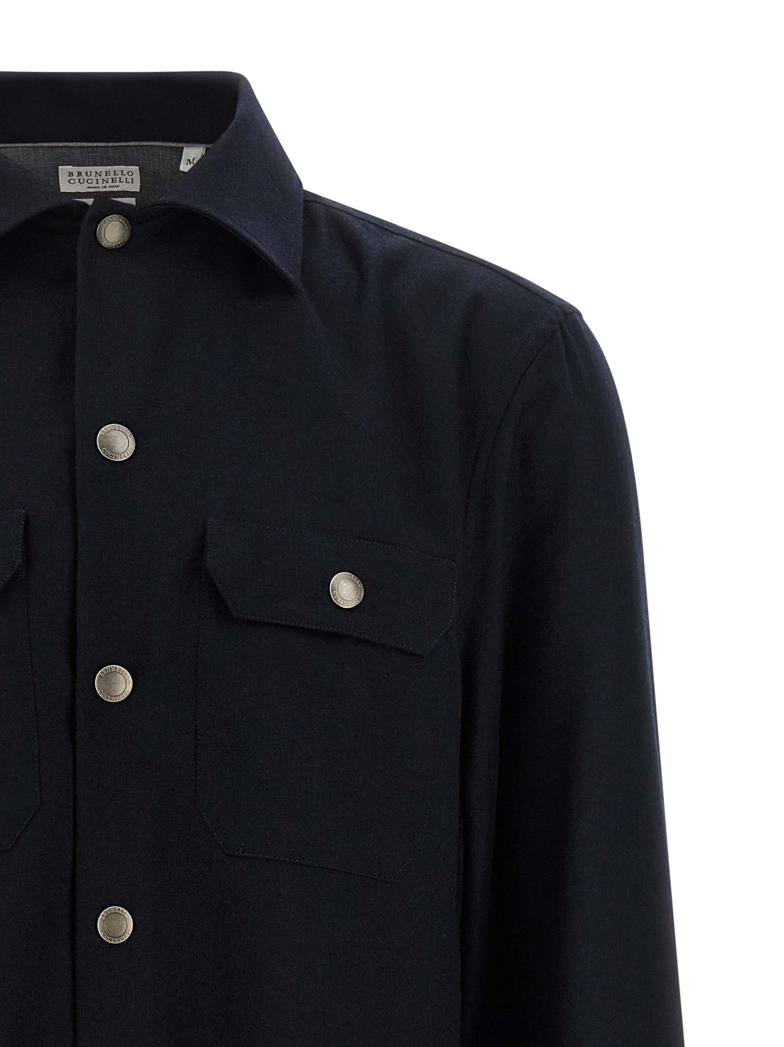 Overshirt by Brunello Cucinelli for men in virgin wool & flannel blue showcases a sublime silhouette, artfully detailed with a sublime and for a sophisticated, sublime finish.