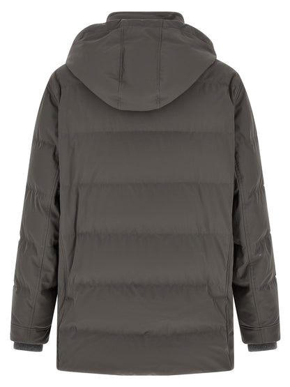 Hooded Parka by Brunello Cucinelli for men in polyamide gray features a stylish silhouette, meticulously detailed with a sophisticated hooded neckline and functional pockets, hooded & insulated for a stylish finish.