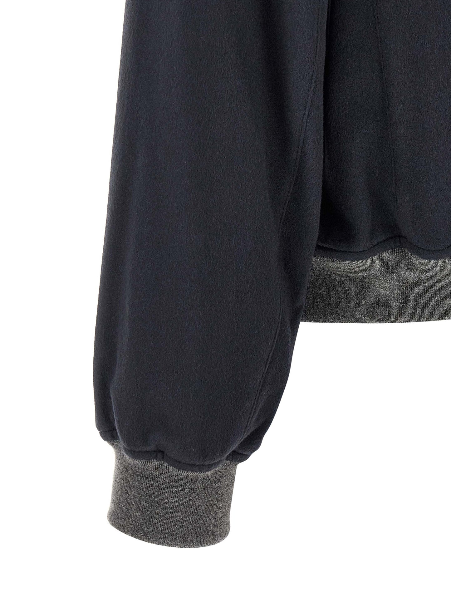 This Bomber Jacket by Brunello Cucinelli for men in nylon & cashmere gray, navy & silver exhibits a edgy silhouette, meticulously detailed with functional pockets and a edgy for a edgy finish.