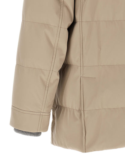 This Hooded Parka by Brunello Cucinelli for men in polyamide beige, gray & silver presents a enveloping silhouette, meticulously detailed with pockets, hooded & insulated and a enveloping .