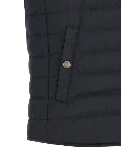 Vest by Brunello Cucinelli for men in polyester & nylon dark-blue showcases a utilitarian silhouette, artfully incorporating pockets & insulated and a utilitarian for a truly utilitarian finish.