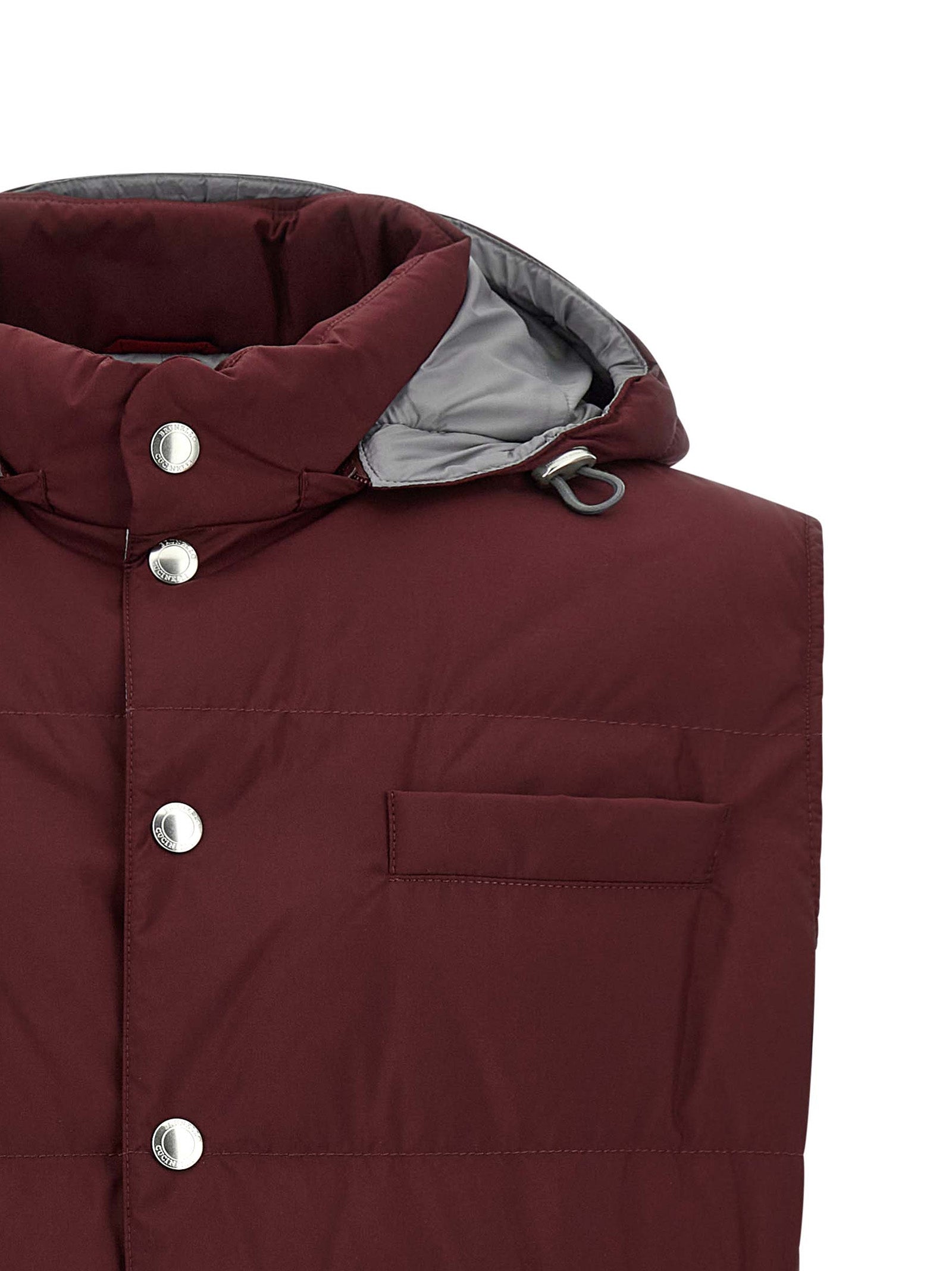 Hooded Vest by Brunello Cucinelli for men in polyester bordeaux, burgundy & silver features a chic silhouette, expertly detailed with a refined hooded high-neck neckline and premium pockets, hooded & insulated for a truly chic look.