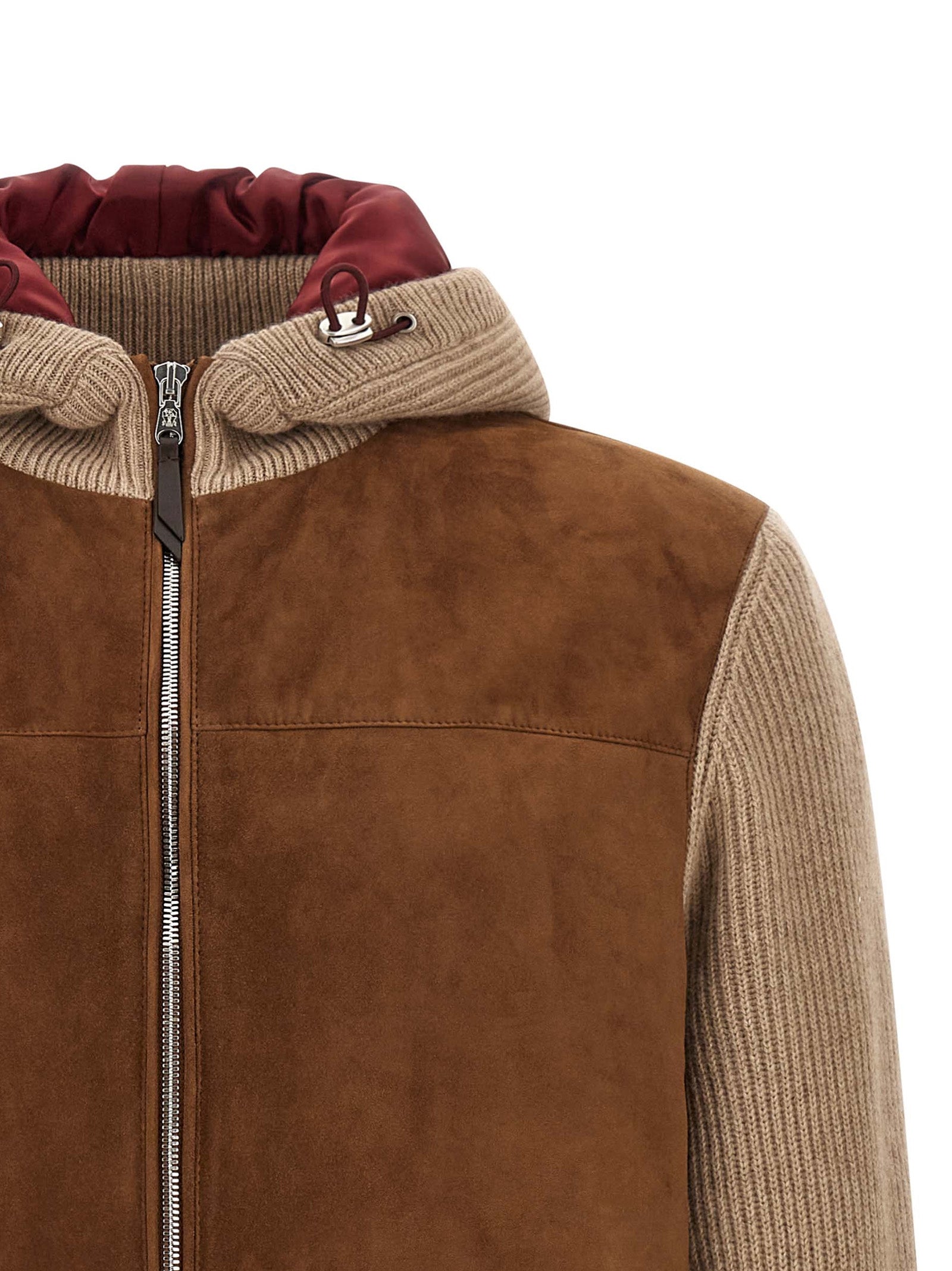 This Hooded Bomber Jacket by Brunello Cucinelli for men in cashmere & suede lamb leather beige, brown & burgundy exhibits a edgy silhouette, meticulously detailed with functional thermal, pockets & hooded and a edgy hooded neckline for a edgy finish.