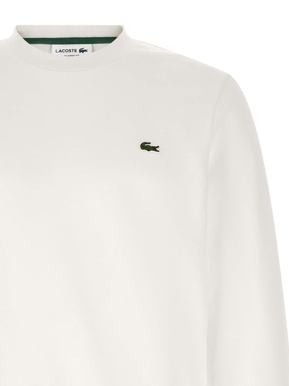 Sweatshirt by Lacoste for men in cotton white features an exquisite silhouette, showcasing and crew neckline details for a exquisite look.