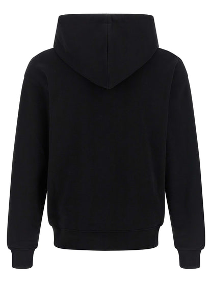 Sweatshirt Hoodie by Moschino for men in cotton black & print features a slouchy chic silhouette, detailed with a slouchy chic and a signature hooded neckline for an elevated aesthetic.