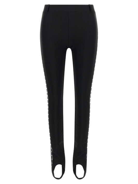 Activewear Leggings by Moschino for women in polyamide bicolour & black features an ergonomic leggings with , highlighting a ergonomic and long for a premium, high-performance look.