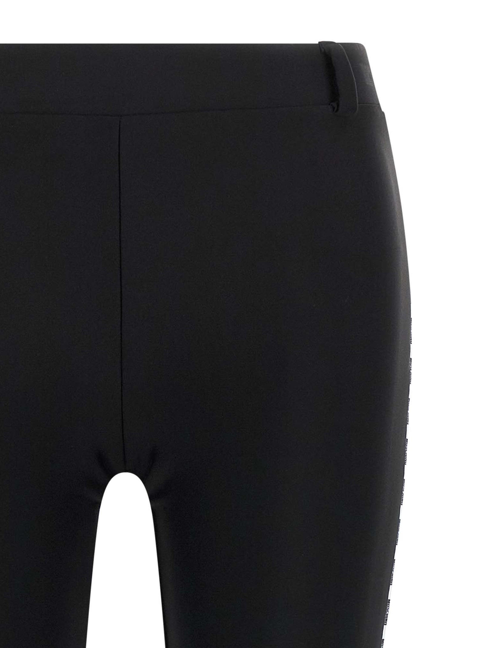 Activewear Leggings by Moschino for women in polyamide bicolour & black features an streamlined leggings and with a long cut, beautifully enhanced by performance-driven .