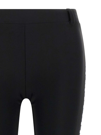 Activewear Leggings by Moschino for women in polyamide bicolour & black features an streamlined leggings and with a long cut, beautifully enhanced by performance-driven .