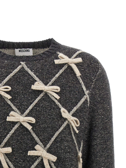 Cardigan by Moschino for women in wool & silk gray & patterned showcases a luxurious silhouette, meticulously detailed with a sophisticated crew neckline and for a refined finish.