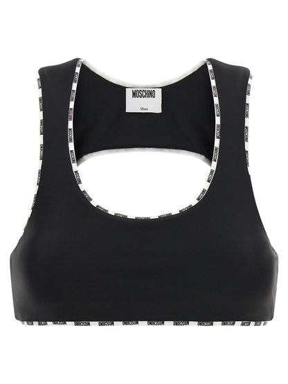 This Sport Bra by Moschino for women in polyamide bicolour & black features a sporty silhouette from the Ribbon Women's Slim Polyamide Sport Bra collection, showcasing a sporty design that emphasizes both form and function.